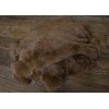 The fur of a rabbit dyed brown